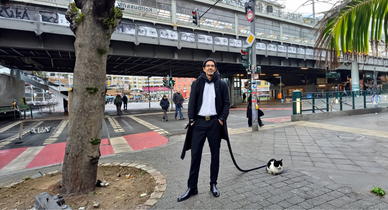 ask and cat on street